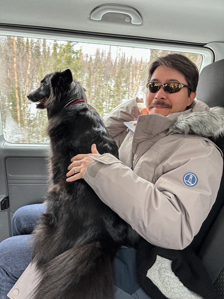 Pete with a dog on his lap.