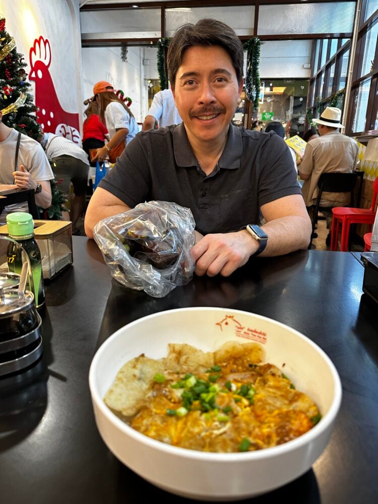 Pete at a restaurant in Thailand