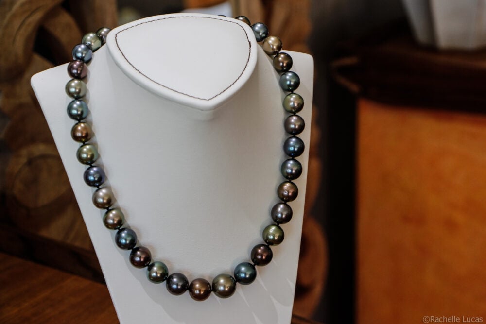 black pearl necklace with stunning variations of color from blue to champagne to green