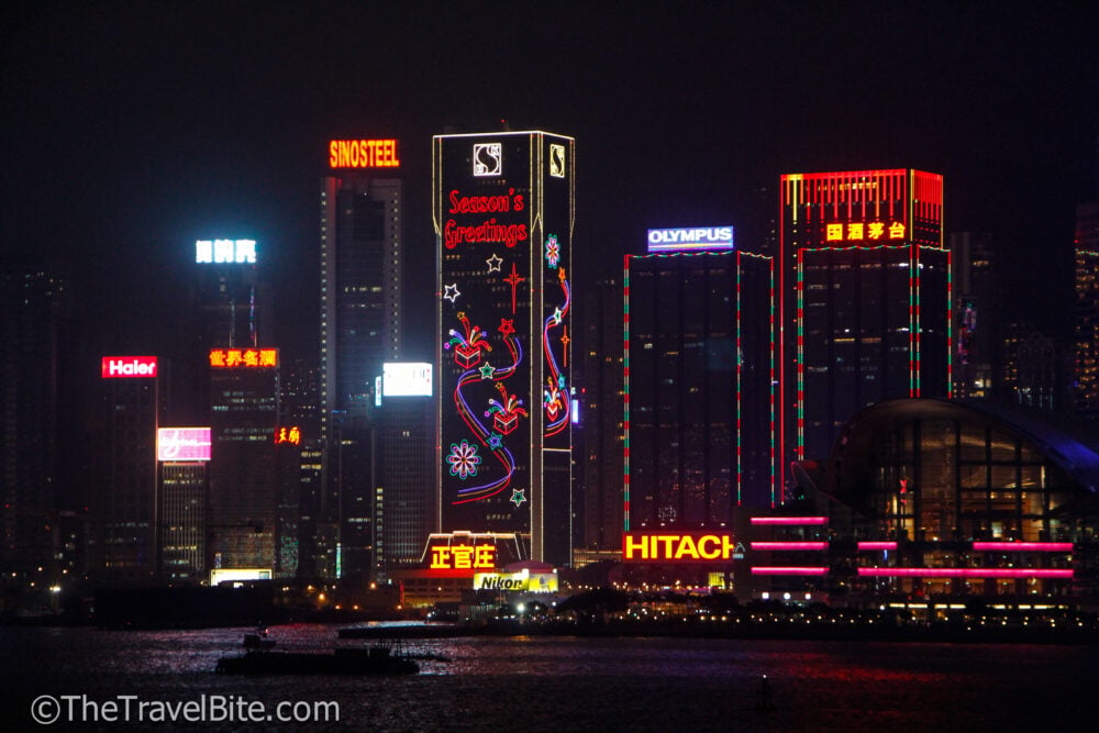 Skyline lit up with neon lights in Victoria harbour for Chinese New Year in Hong Kong