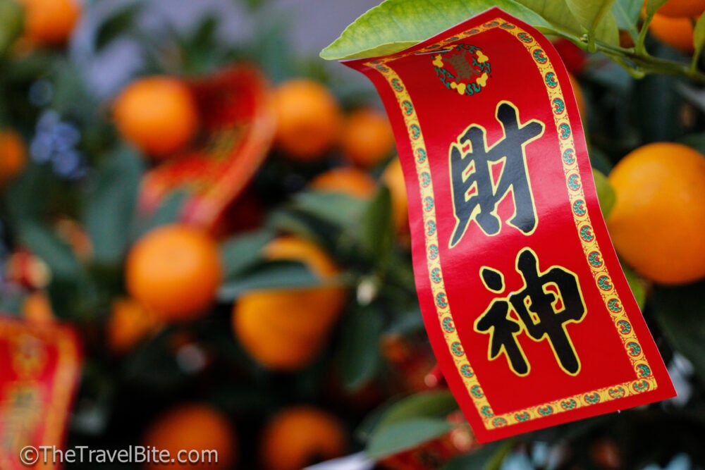 Mandarins with a red wish in Chinese