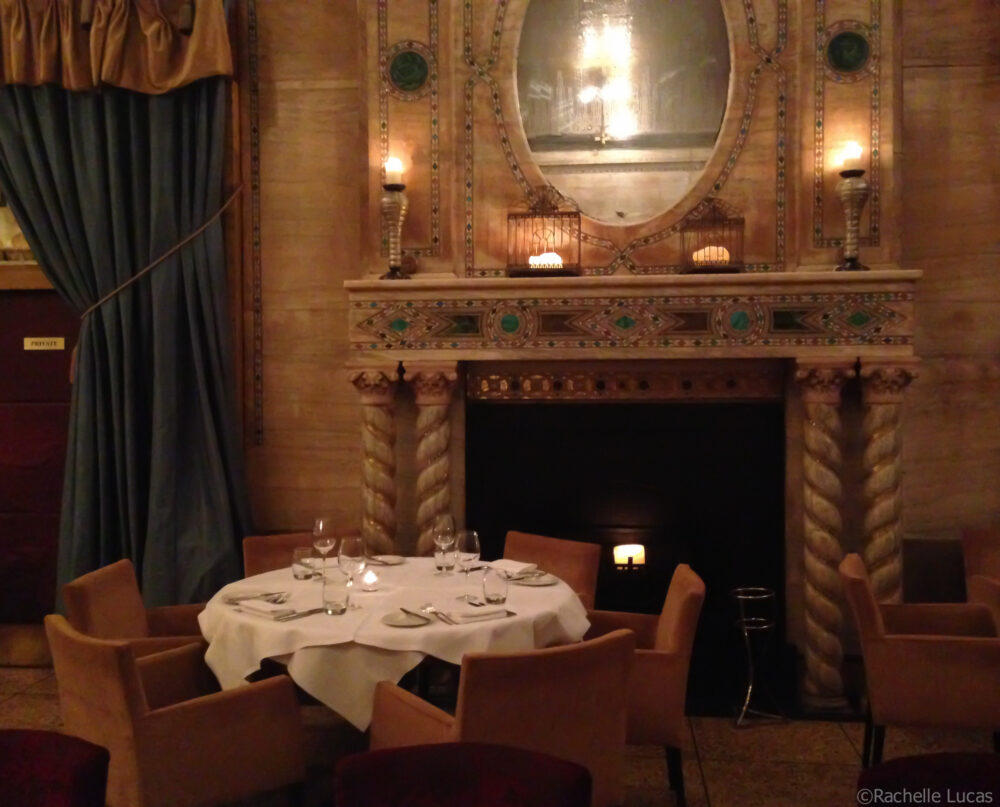 Photo of dining table by fireplace