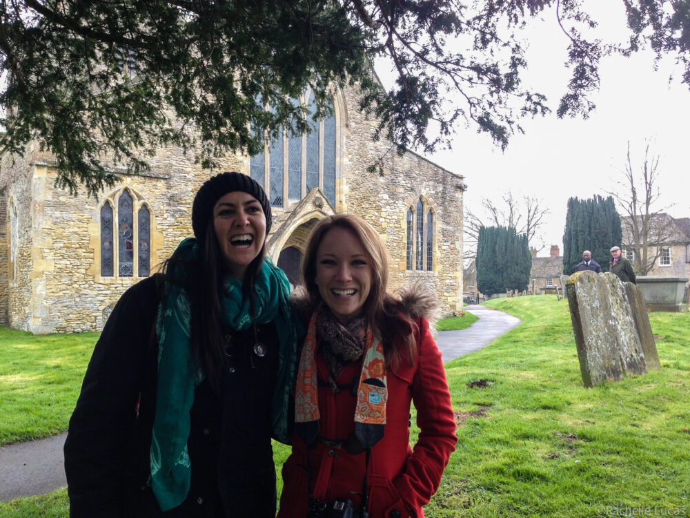 Rachelle and friend Katie in front of church in Bampton Village