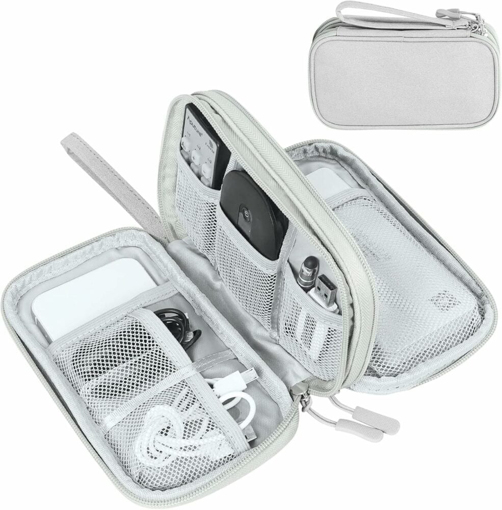 travel tech organizer with mesh pockets organizing cables and electronics for travel