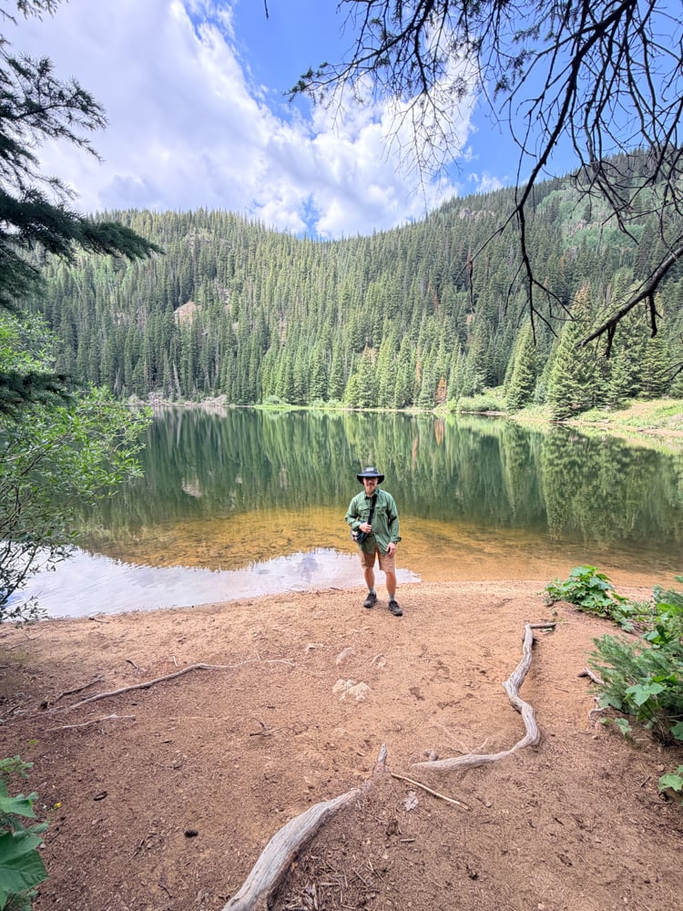Pete standing in front of Beaver Lake