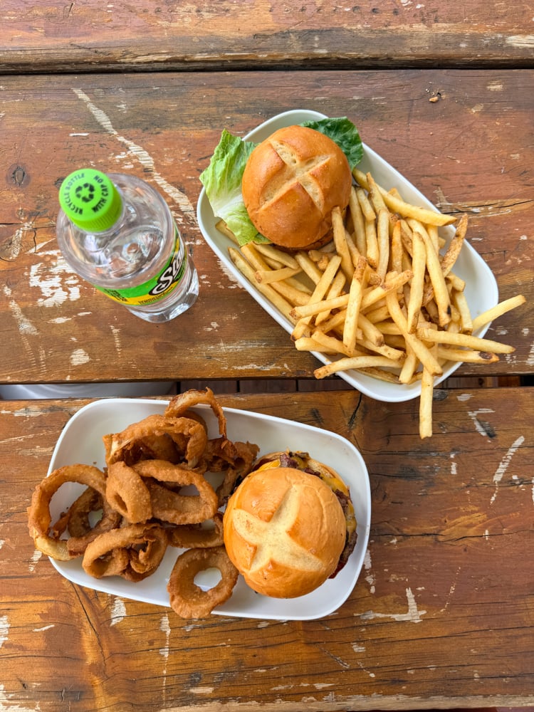 Burgers fries and onion rings 