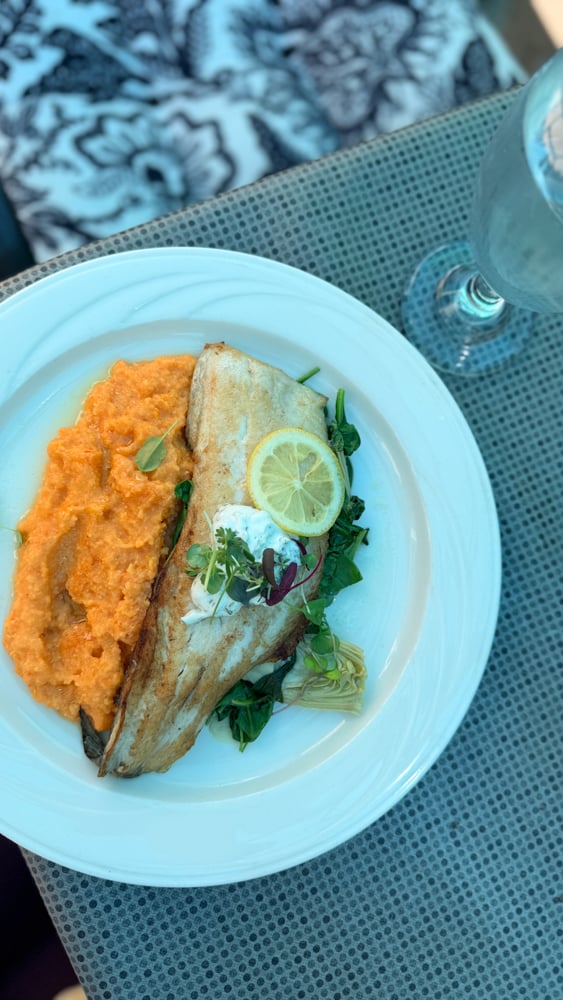 Colorado rainbow trout served with red pepper polenta at The Eagle Inn