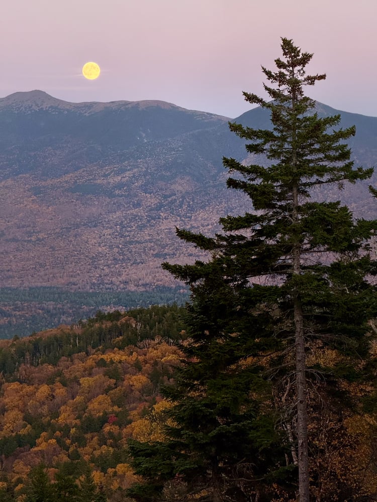 full moon rising over Mount Washington at the Bretton Woods Full Moon Summit Dinner Series