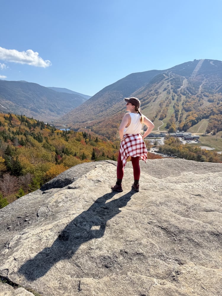 Rachelle standing at the look out on top of Bald Mountain