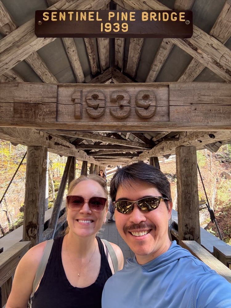 Rachelle and Pete under another covered bridge called the sentinel pine bridge built in 1939