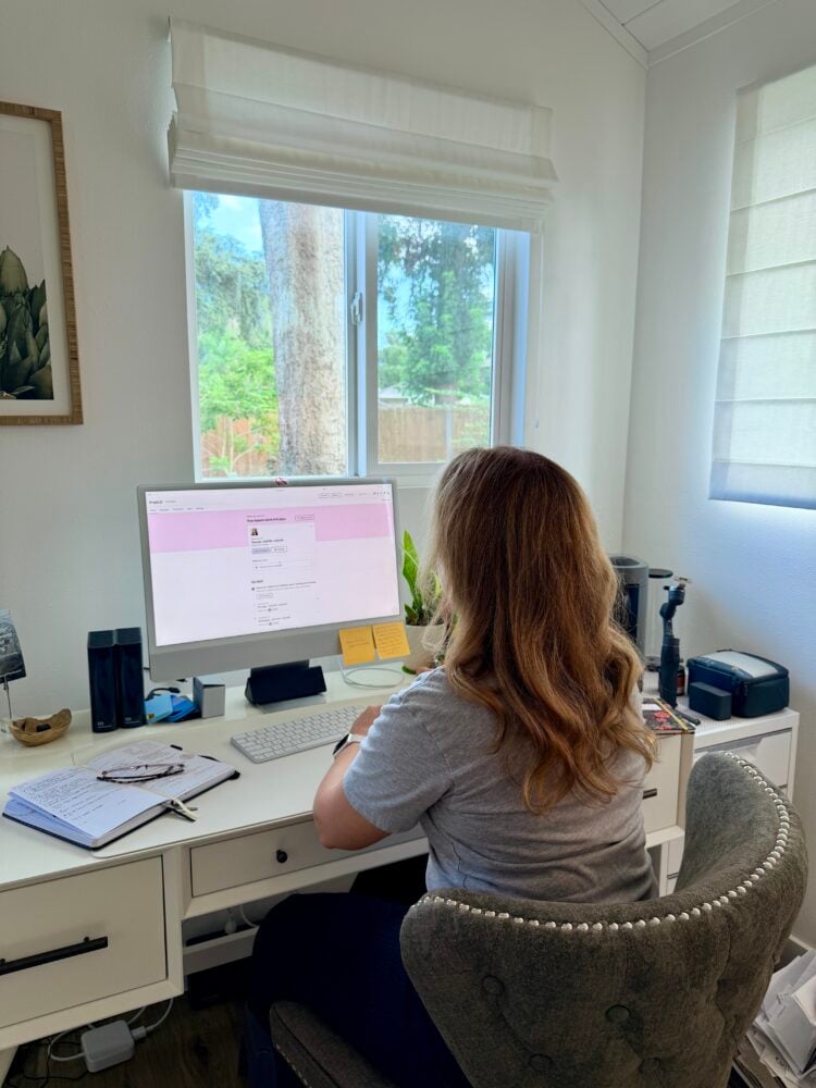 Rachelle at desk studying Preply.