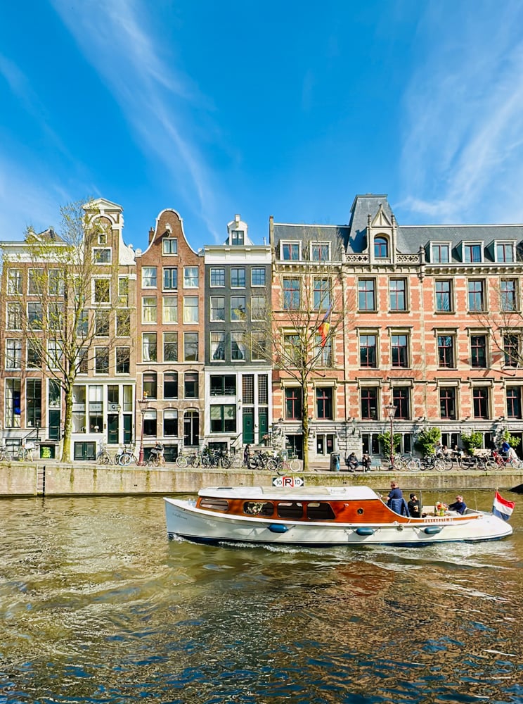 Historic canal houses along an Amsterdam canal