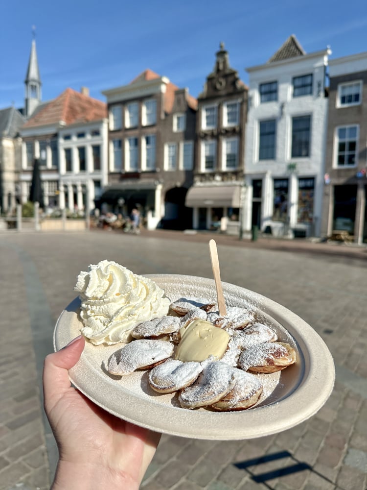 Fresh poffertjes with powdered sugar in Zierikzee