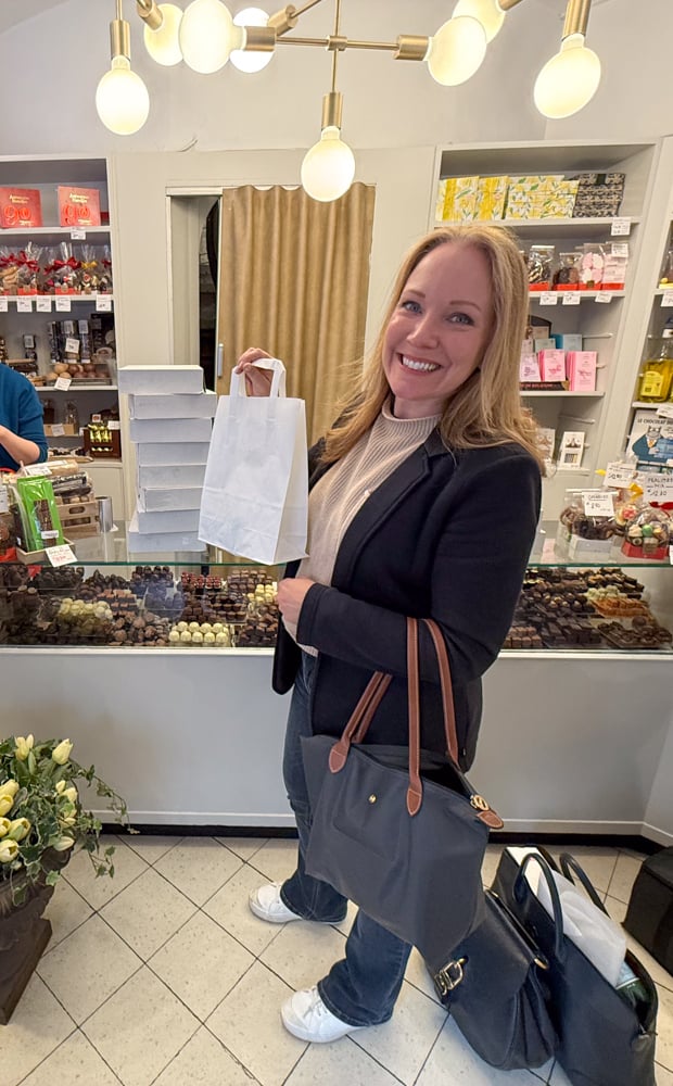 Rachelle buying chocolate in Antwerp