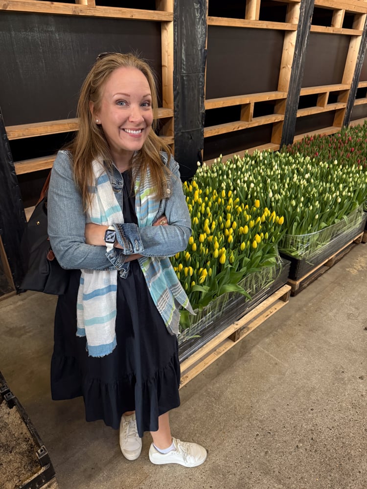 Rachelle in front of tulips at tulip farm