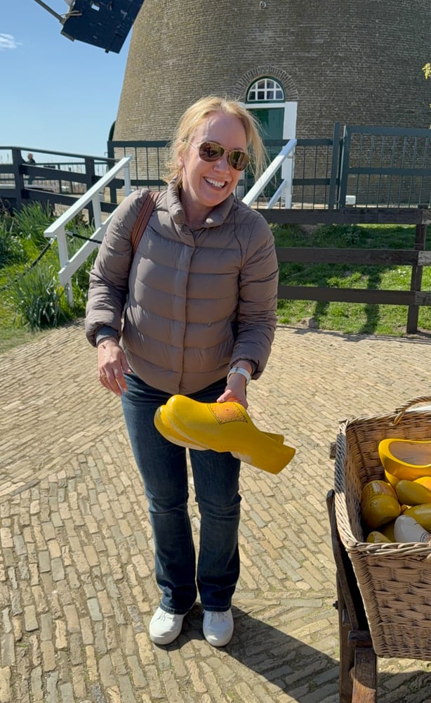 Rachelle tryin on yellow Dutch wooden clogs