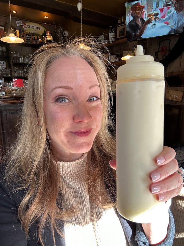 Rachelle holding giant bottle of mayonnaise